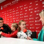 Family Tour of Anfield Stadium - Press Room Anfield Stadium Press Room - Family of 4