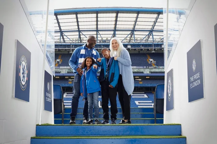 Family enjoying Chelsea FC stadium tour at Stamford Bridge